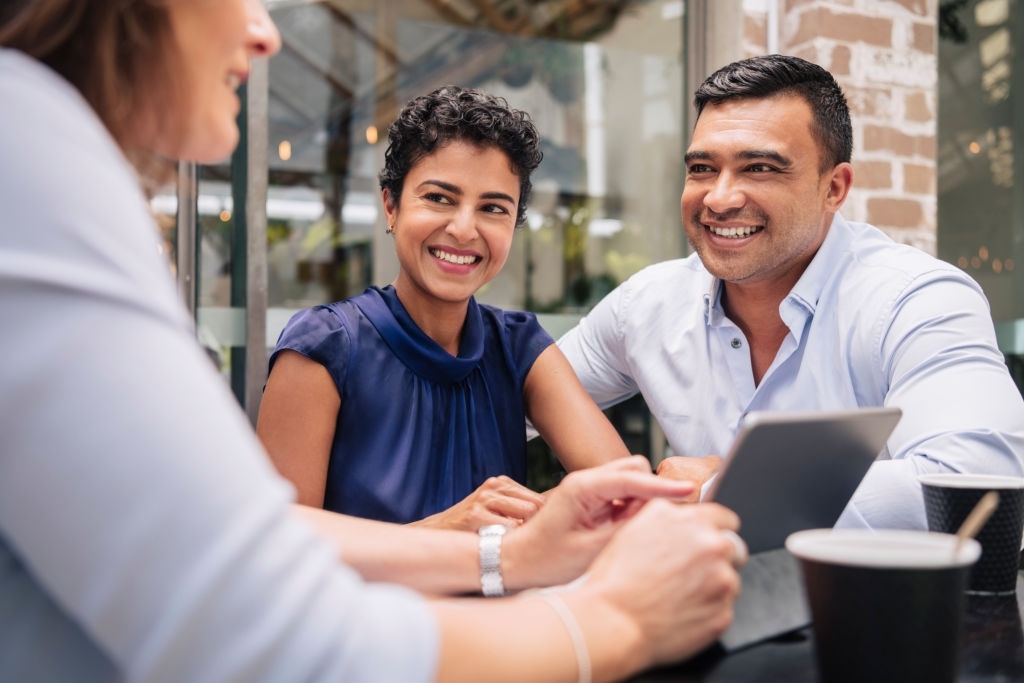 Smiling mature couple get good advice